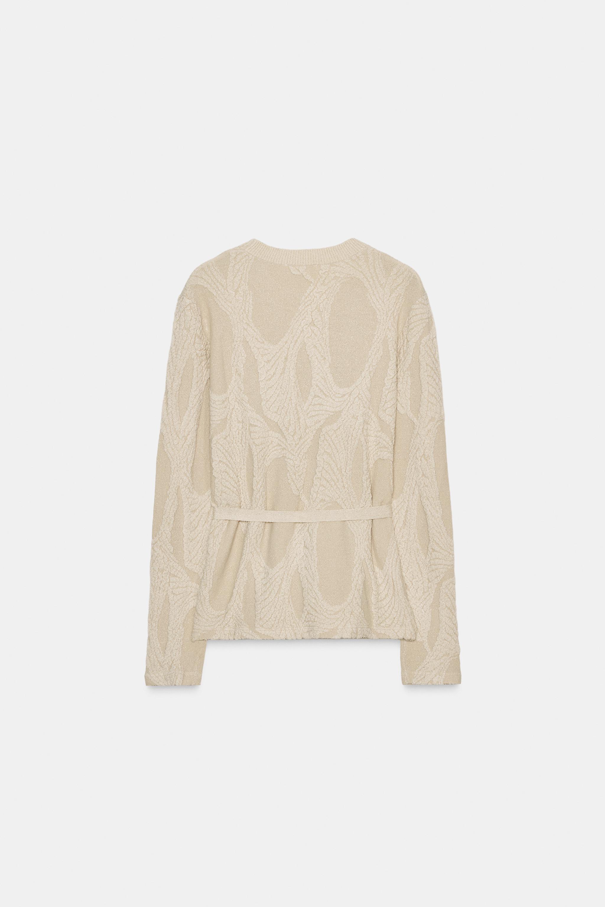 JACQUARD BELTED SWEATER